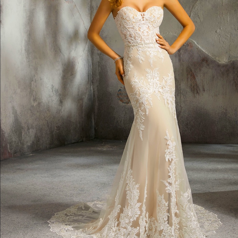 NWT and altered Wedding dress. Absolutely stunning.